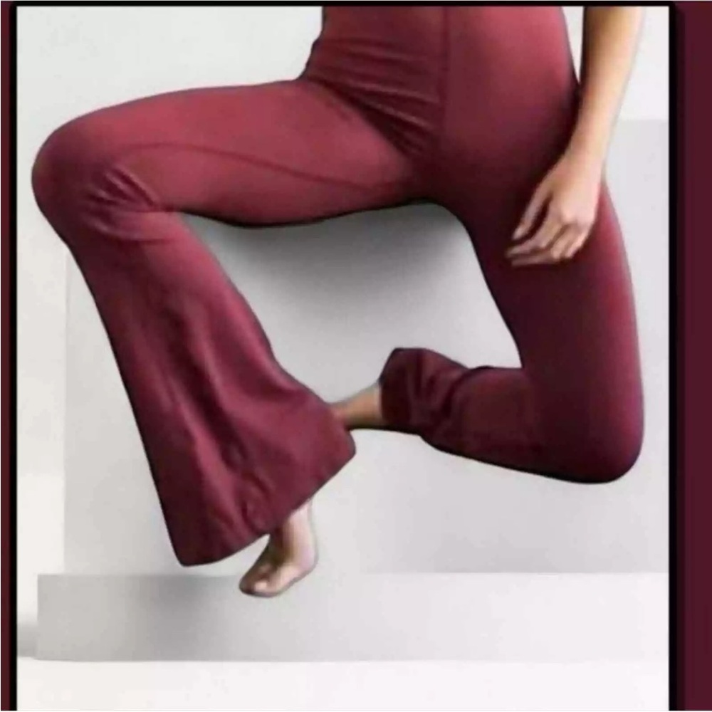 NWOT Free people movement good karma flares in burgundy m/l